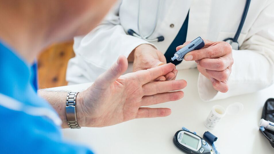 Doctor takes blood to find sugar in diabetes